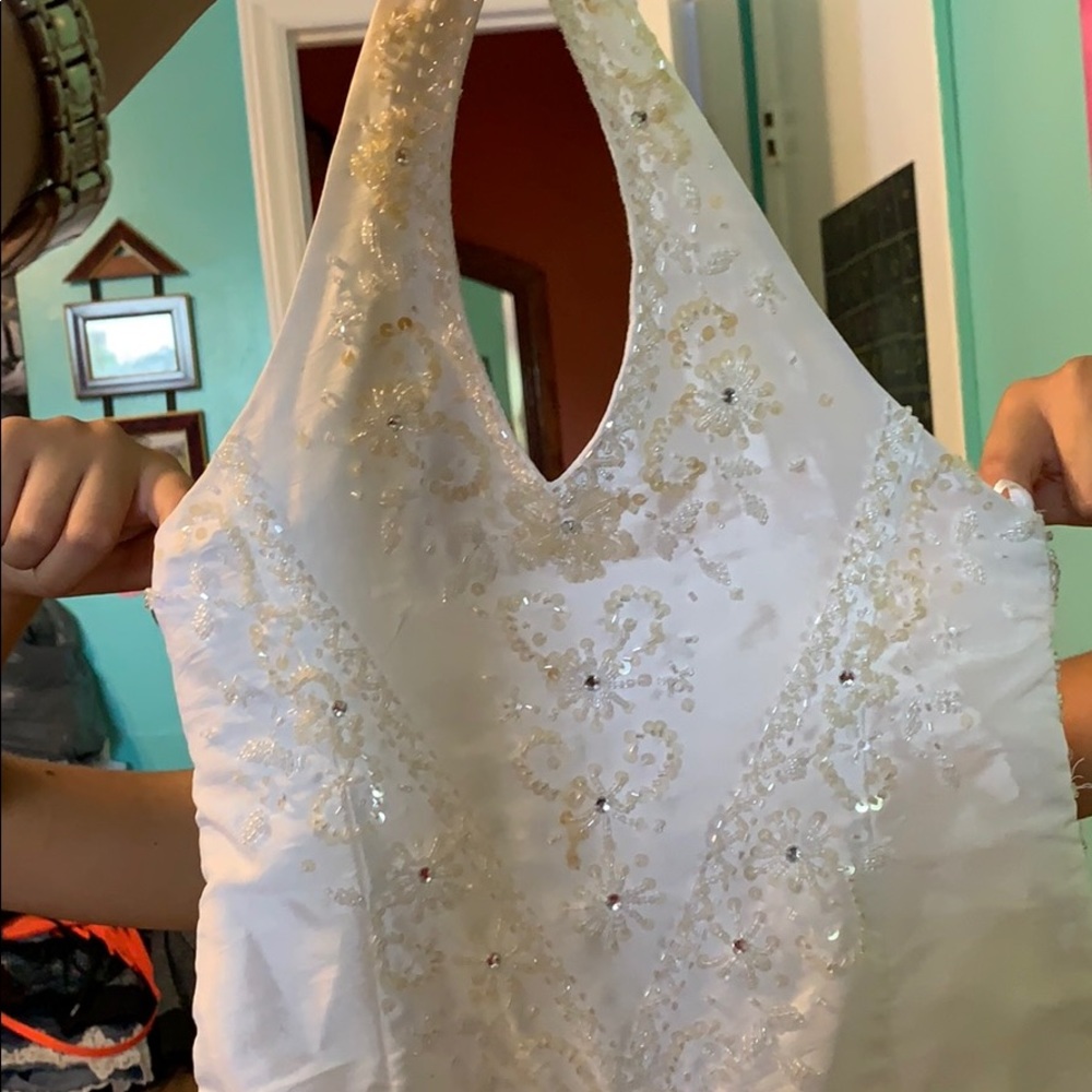 This is a all white crystal design train dress